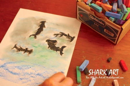 Nana brings the art fun with Sharks Video Art Lessons! All it takes is a starter set of chalk pastels, construction paper and Nana’s video art lessons for a celebration of Shark Week or to thrill your shark enthusiast. No expensive, intimidating list of art supplies. This set of Sharks Video Art Lessons is a wonderful stand alone art curriculum or a perfect complement to your summer fun or shark learning throughout the year.